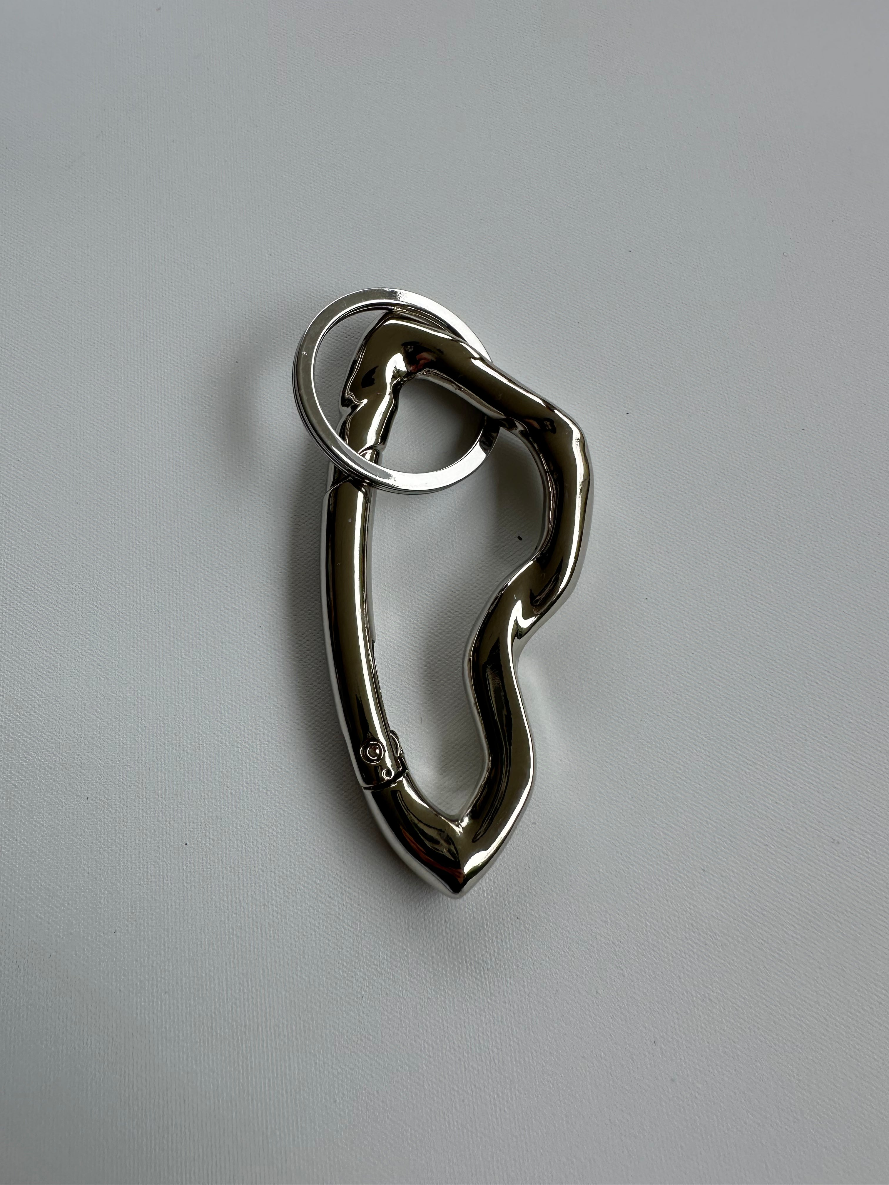 ABSTRACT CARABINER