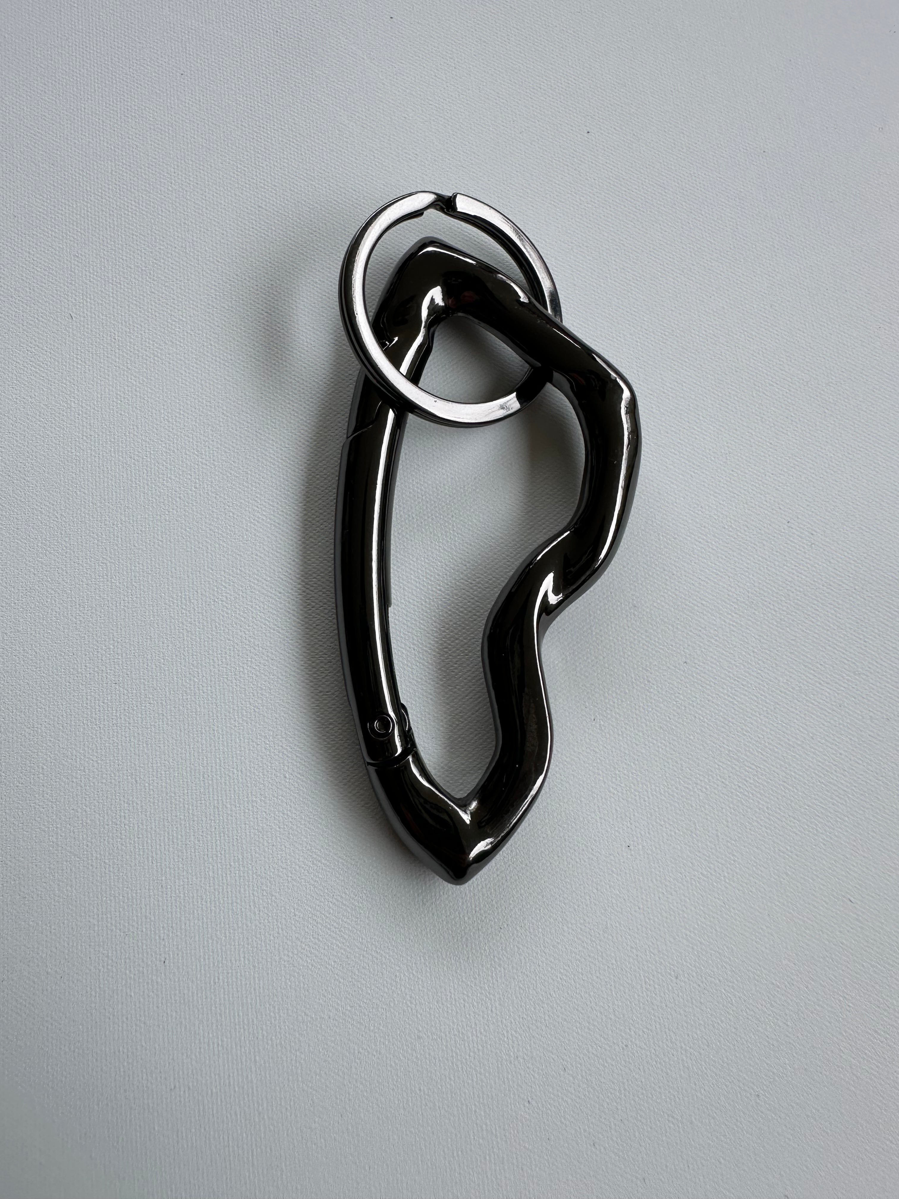 ABSTRACT CARABINER